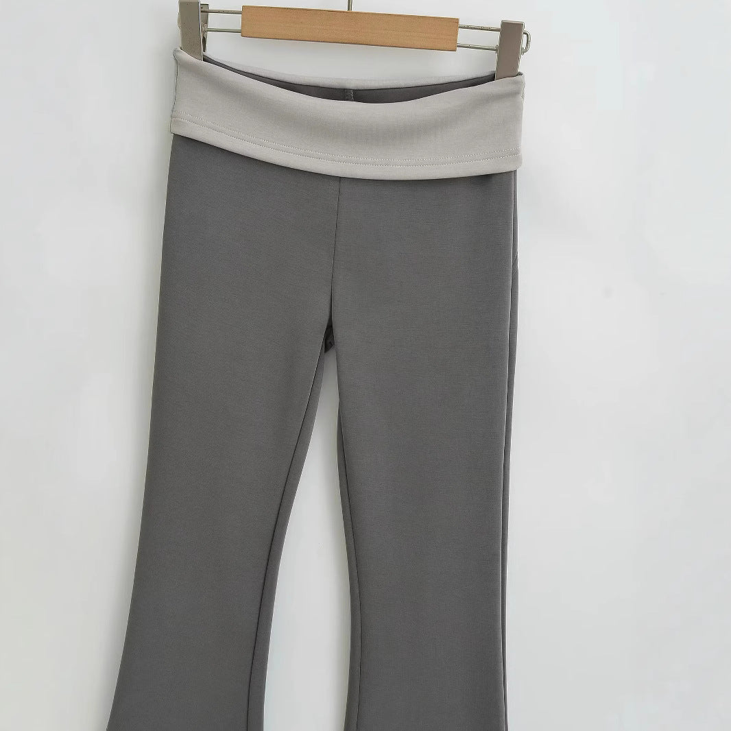 Contrasting color flanged low waisted slightly flared pants