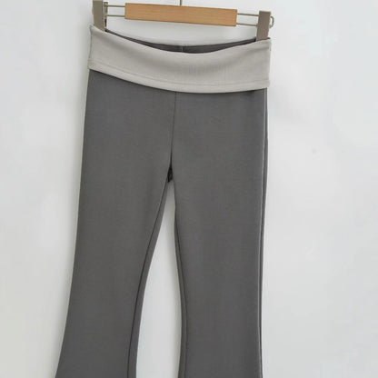Contrasting color flanged low waisted slightly flared pants